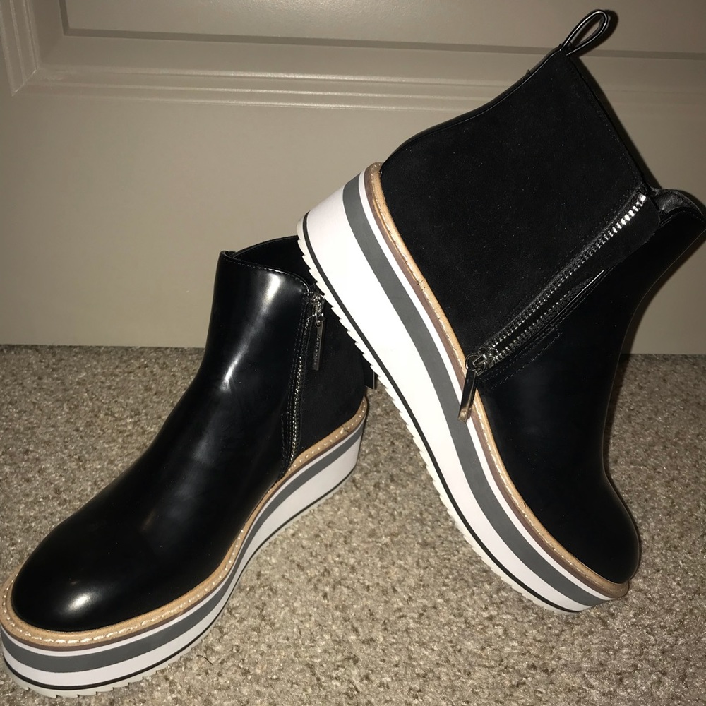 Leather/ suede platform zip-up ankle boots.